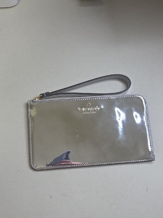 kate spade Handbags - kate spade Silver Metallic Wristlet Clutch